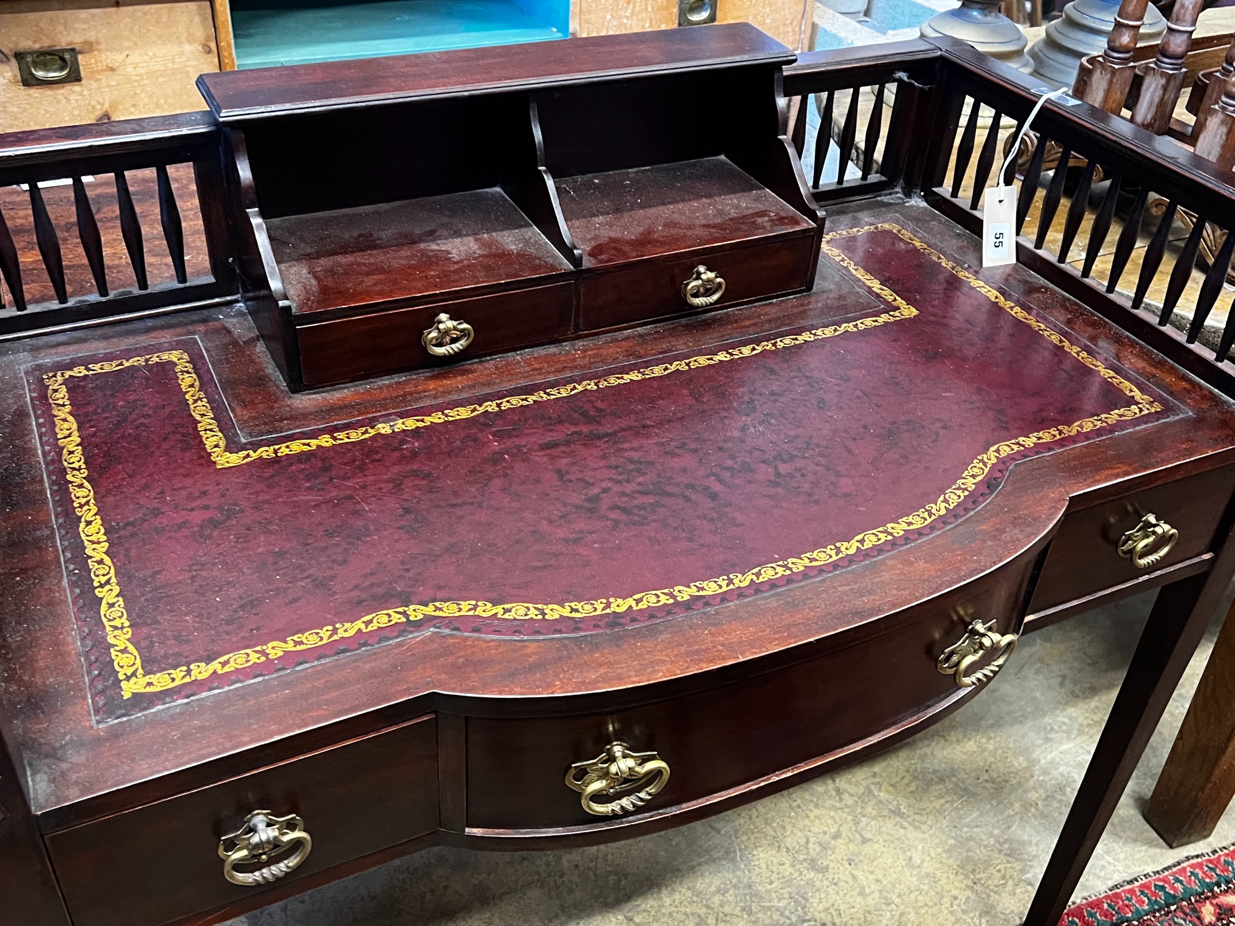 An Edwardian mahogany writing table, length 96cm, depth 49cm, height 88cm
